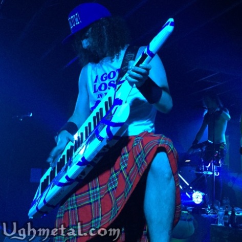 Vocalist and the Captain of Alestorm, Christopher Bowes, shows off his keytar skills after successfully escaping the Gay Dolphin. 