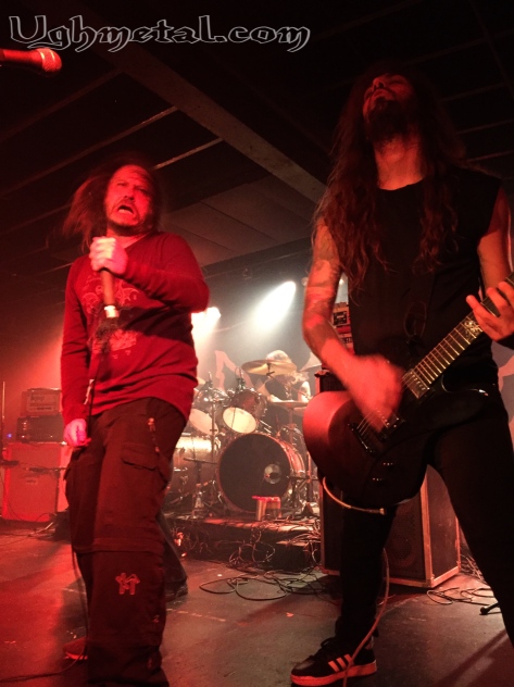 Lars Göran Petrov of Entombed AD shows us his party face while guitarist Guilherme Miranda shies away. 